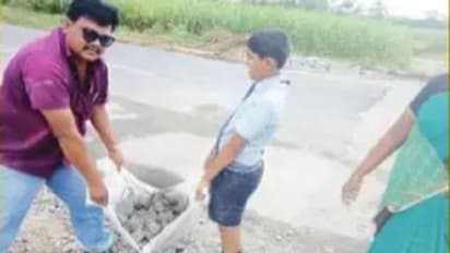 ತಮ್ಮ ಮಕ್ಕಳೊಂದಿಗೆ ರಸ್ತೆ ಗುಂಡಿ ಮುಚ್ಚಿದ ಶಿಕ್ಷಕ ದಂಪತಿ