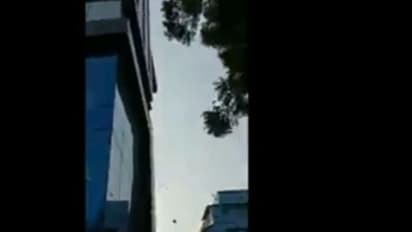 ಕಟ್ಟಡದ ಮೇಲಿಂದ ಸುರಿಯಿತು ನೋಟಿನ ಸುರಿಮಳೆ!