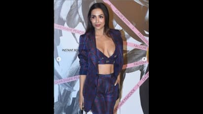 Malaika Arora suffers wardrobe malfunction at store launch
