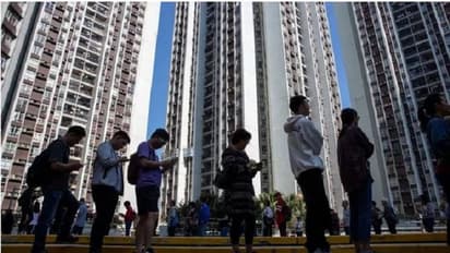 Hong Kong shares lead gains in Asia as democrats sweep elections