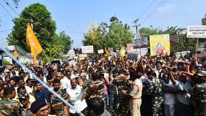 మూడు రాజధానుల వివాదం... డీఎస్పీ కాలర్ పట్టుకున్న టీడీపీ నేతలు