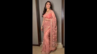 51 வயதில் செக்ஸியஸ்ட் வுமன் பட்டியலில் இடம்பிடித்த நடிகை மாதுரி  தீக்ஷித்! விதவிதமான ட்ரான்ஸ்பரென்ட் சேலையில் மின்னும் செம்ம ஹாட் போட்டோஸ்!