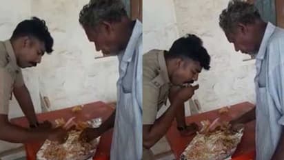 'വരൂ, ഒരുമിച്ചിരുന്ന് കഴിക്കാം...';വിശന്നു വലഞ്ഞ വയോധികനൊപ്പം ഒരേ പൊതിയിൽ ഭക്ഷണം കഴിക്കുന്ന പൊലീസുകാരൻ; കൈയ്യടിച്ച് സോഷ്യൽ മീഡിയ