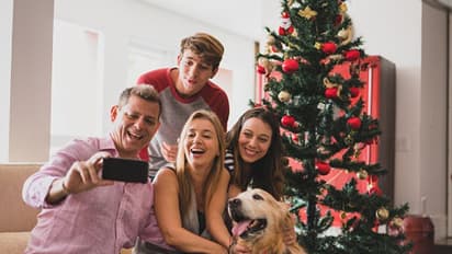 Picture perfect moments with the Christmas tree