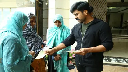 వీరాభిమాని ఇంట్లో రామ్ చరణ్.. రూ.10 లక్షల విరాళం(ఫొటోస్)