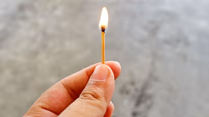 Refused to talk; man sets woman on fire