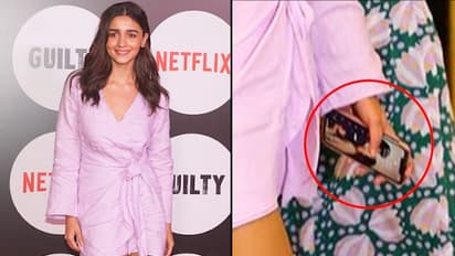 Watch: Who is Alia Bhatt kissing on her iPhone screensaver?