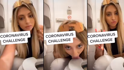 #Coronachallenge : ವಿಮಾನದ ಟಾಯ್ಲೆಟ್ ಸೀಟ್ ನೆಕ್ಕಿದ ಮಾಡೆಲ್