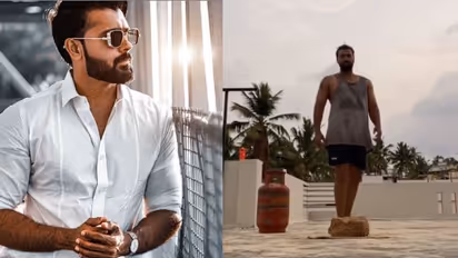 ഡംബല്സ് ഇല്ലെങ്കിലെന്താ ഗ്യാസുകുറ്റിയുണ്ടല്ലോ: ലോക്ക് ഡൗണില് 'ഹോം ജിമ്മു'മായി വിവേക് ഗോപന്