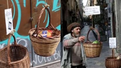 പാവപ്പെട്ടവരുടെ വിശപ്പകറ്റാൻ വേറിട്ട മാതൃക; ബാൽക്കണിയിൽ ഭക്ഷണ സാധനങ്ങൾ അടങ്ങിയ കുട്ടകൾ തൂക്കി ഇറ്റാലിയൻ ജനത