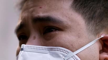 China again reports coronavirus, nearly 100 cases in single day