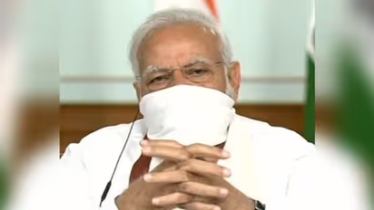 India under lockdown: PM Modi wears homemade face mask as he meets CMs