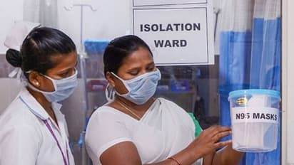 కొడుకును చూడాలని.. ఐసోలేషన్ వార్డ్ నుంచి మహిళ..