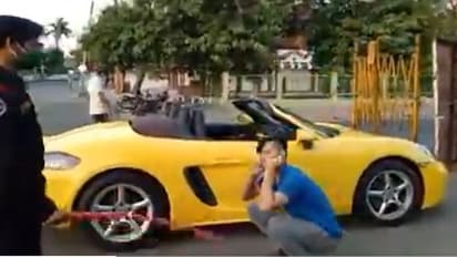 ಲಾಕ್ಡೌನ್ ನಡುವೆ ಪೊರ್ಶೆ ಕಾರಿನಲ್ಲಿ ಸುತ್ತಾಟ, ಬಸ್ಕಿ ಹೊಡೆಸಿದ ಪೊಲೀಸ್!