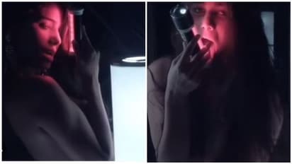 அடல்ட் ஒன்லி..! மீன் தொட்டி முன் அரை நிர்வாணமாக அன்னநடை போட்ட ஆபாச நடிகை... சர்ச்சை வீடியோ...!