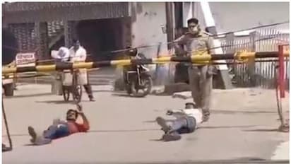 മാസ്ക്ക് ധരിക്കാത്ത യുവാക്കള്ക്ക് പൊരിവെയിലിൽ ശയന പ്രദക്ഷിണം, പൊലീസുകാര്ക്കെതിരെ നടപടി