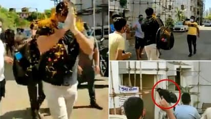 കൊവിഡിനെ ചെറുത്ത് തോൽപ്പിച്ച് പൊലീസുകാരൻ വീട്ടിലേക്ക്; പുഷ്പവൃഷ്ടി നടത്തി വരവേറ്റ് നാട്ടുകാര്- വീഡിയോ