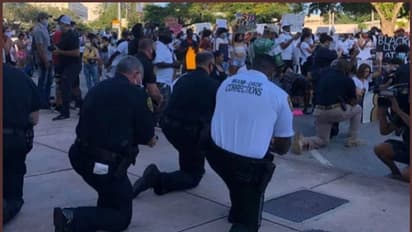 'ജോ​ർ​ജ് ഫ്ളോ​യ്ഡിന് നീതിവേണം': പ്രക്ഷോഭകര്‍ക്ക് മുന്നില്‍ മുട്ടുകുത്തി അമേരിക്കന്‍ പൊലീസ്