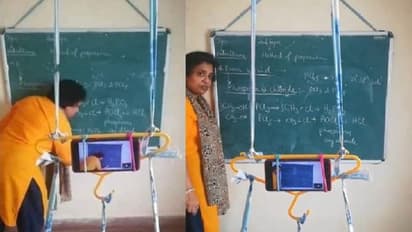 ഓൺലൈൻ ക്ലാസ് എടുക്കാൻ 'ട്രൈപോഡ്' ഇല്ലെങ്കിൽ എന്താ, 'ഹാങ്ങർ' ഉണ്ടല്ലോ, തരംഗമായി ഈ കെമിസ്ട്രി ടീച്ചറുടെ സൂത്രം