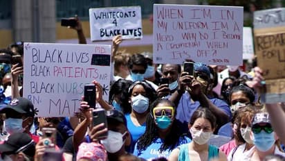 అమెరికాలో మరో దారుణం: పోలీసుల కాల్పుల్లో మరో నల్ల జాతీయుడి మరణం