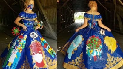 400 മണികൂര്, 750 മീറ്റര് ഇന്സുലേഷന് ടേപ്പ്; കൊറോണ തീമില് ഒരു ഗൗണ് !