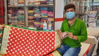 বিয়ের আসরে 'মাস্ক বিপ্লব', অভিনব উদ্যোগ তাক লাগালেন রায়গঞ্জের ব্যবসায়ীরা