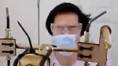 এবার থেকে মাস্ক পরাবে মেশিন, ভাইরাল হওয়া ভিডিওতে চোখ রাখুন আপনিও
