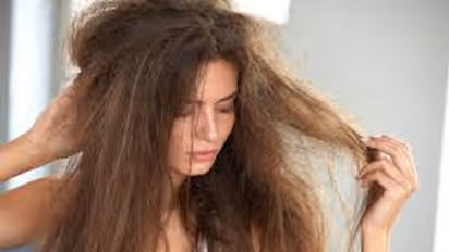 Say goodbye to frizzy hair this winter with these home remedies