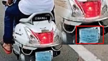 నెంబర్ ప్లేట్లకు మాస్కులు వేస్తున్న వాహనదారులు.. తల పట్టుకుంటున్న పోలీసులు..