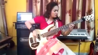 Sari-clad woman plays bass riff on progressive metal song Sea of Lies; video goes viral