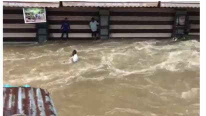 హైద్రాబాద్ వరద నీటిలో కొట్టుకుపోతున్న వ్యక్తి, హాహాకారాలు (వీడియో)