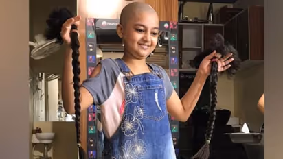 Maturity way beyond her years: 10-yr-old child artist gets head tonsured for cancer patients