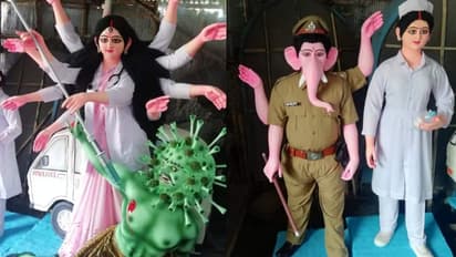 প্রথম সারির করোনা যোদ্ধাদের সম্মান, করোনারূপী অসুরকে ইঞ্জেকশন দিয়ে বধ করছেন মা দুর্গা