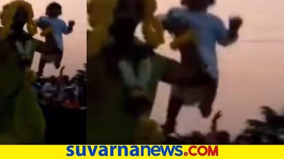 ಪುಟ್ಟ ಮಗುವನ್ನು ಕೈಯಲ್ಲಿ ಹಿಡಿದು ಕೆಂಡ ಹಾಯ್ದ ಅರ್ಚಕ : ವೈರಲ್