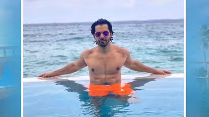 Is Varun Dhawan going to reveal his secret lady? Check out