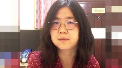 মহামারির এক বছর পরেও উহানের ঘা শুকিয়ে যায়নি, তারই প্রমাণ দিল চিনা সাংবাদিকের জেল