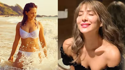 Kim Sharma, Leander Paes take pet dog for a walk, netizens ask 'Please mention who's the dog??'