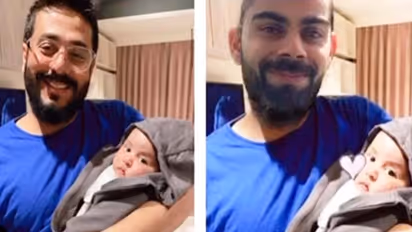 Is Virat Kohli carrying Vamika or Raj Chakraborty's son Yuvaan? (See Picture)