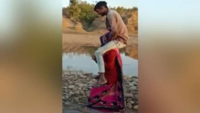 భర్తను వదిలేసి మరో వ్యక్తితో అఫైర్.. మహిళ భుజాలపై యువకుడిని ఎక్కించి...