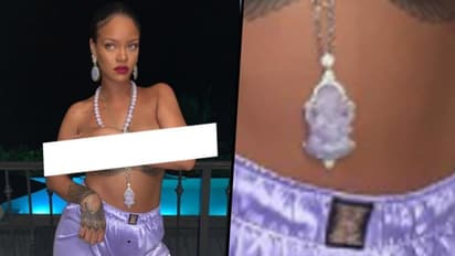 Rihanna called out for hurting sentiments, poses topless wearing Ganesha pendant