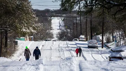 US: Millions endure deep freeze without power, at least 21 dead