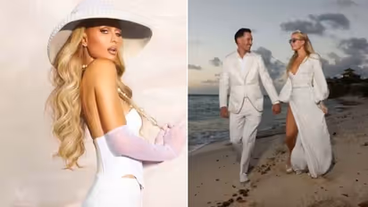 FIRST LOOK OUT: Paris Hilton is now Mrs Carter Reum; bride wears Oscar de la Renta gown