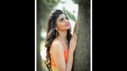 జనాలను వదిలేసి వనాలకు వెళ్లిన వర్ష... పచ్చని తోటలో రామ చిలకలా ఉందిగా!