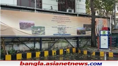 কমিশনের নির্দেশে শহরের পেট্রোল পাম্পে মোদীর ছবি ঢাকল পেপারে-প্লাস্টিকে, দেখুন ছবি