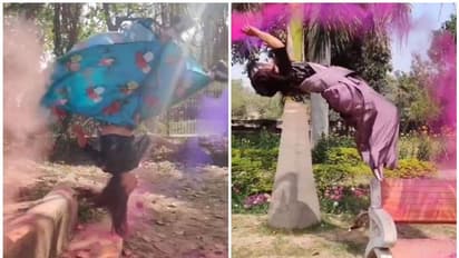 'ഹോളി ഇങ്ങനെയും ആഘോഷിക്കാം....'; സാരിയില്‍ അനായാസം തലകുത്തി മറിഞ്ഞ് യുവതി