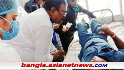 হেলমেট পরে পালাতে হল নির্মল মাজিকে, গ্রামবাসীদের ইটের ঘায়ে জখম মন্ত্রীর দেহরক্ষী