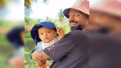 IPL 2021: Hardik Pandya fathers son Agastya in a candid fashion (Watch video)