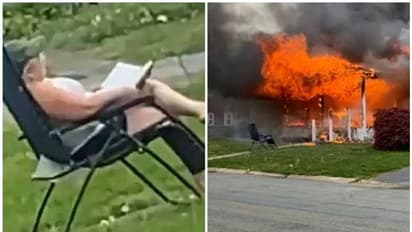 സ്വന്തം വീടിന് തീയിട്ട് അല്പ്പം മാറി കസേരയിലിരുന്നു ഇതൊക്കെ കണ്ട് ഒരു സ്ത്രീ