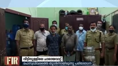 വീട്ടിനുള്ളിലെ വിറകടുപ്പിൽ ചാരായം വാറ്റിയ 2 പേർ പിടിയില്