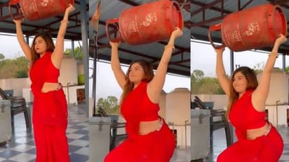 ഗ്യാസ് സിലിണ്ടർ പൊക്കി പിടിച്ച് 'സ്ക്വാട്ട്സ്' ചെയ്യുന്ന യുവതി; വര്ക്കൗട്ട് വീഡിയോ വൈറല്